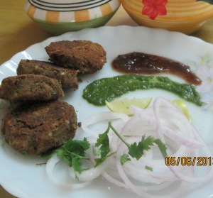 Kebabs with tamarind and green chutney.